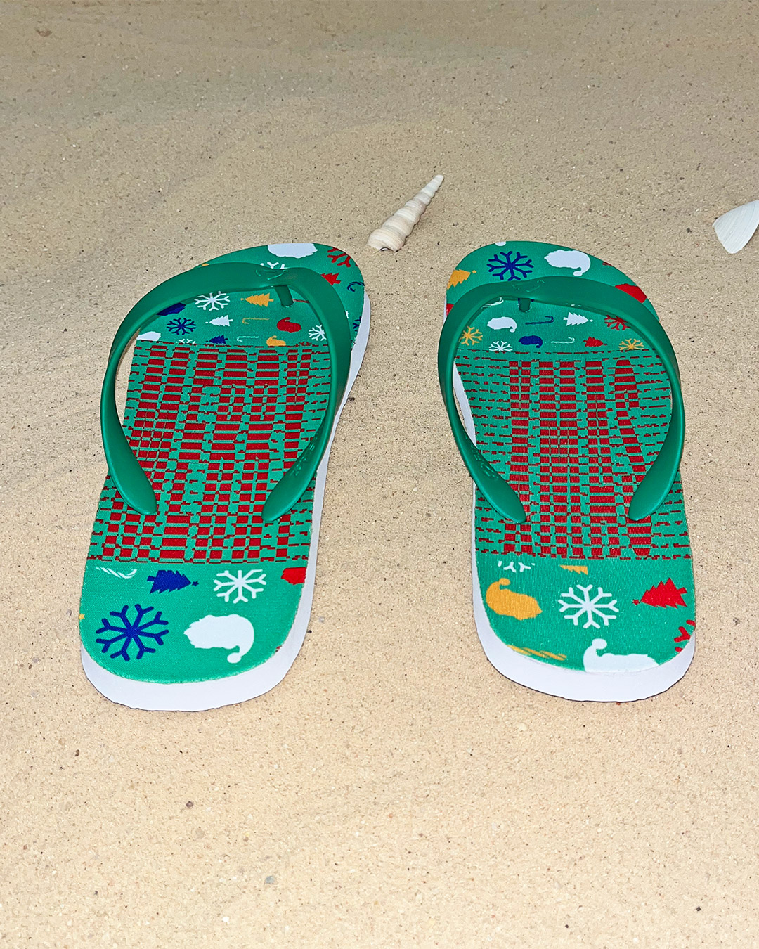 The Christmas flip flops seen from the heel, showing their hidden message